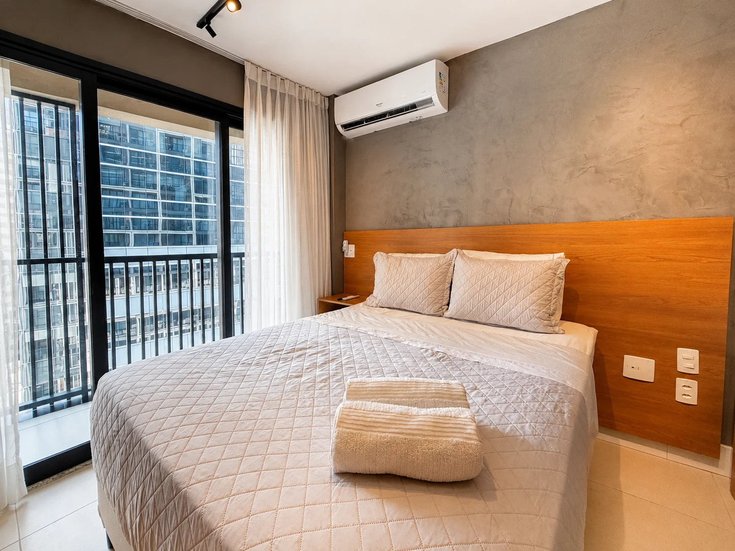 Skylux 1811 bedroom with a prepared bed, white linen and towels
